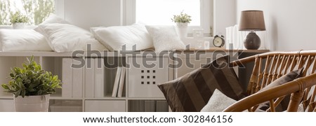 Banner of white wooden sideboard in cosy living room