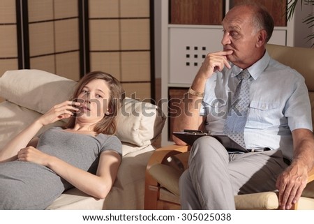 Photo of rich worried businesswoman and her private therapist