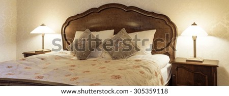 Hotel room bedroom with antique furniture