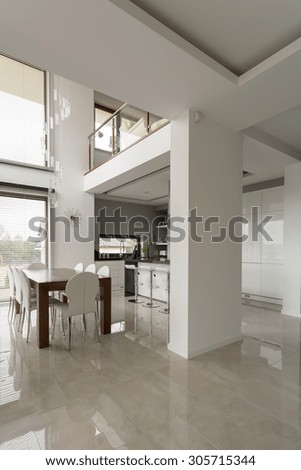 Exclusive spacious dining hall with shining marble floor