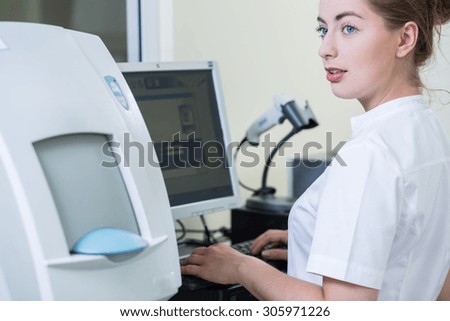 Young beauty woman working in research laboratory