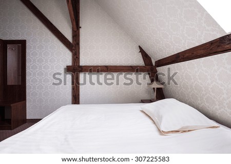 Luxury bright bedroom in elegant detached house