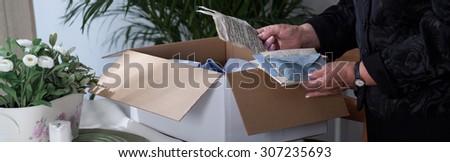 Close-up of old letters in carton box