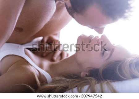 Photo of couple of lovers during romantic scene in bedroom