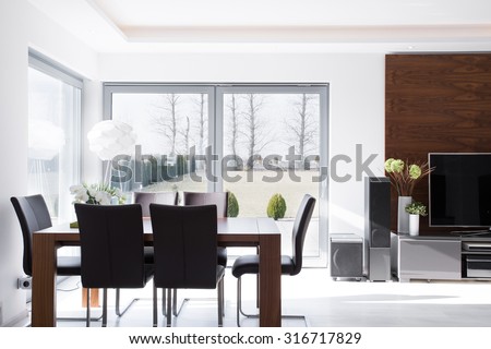 Interior of minimalistic modern bright dining room