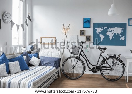 Urban bike standing in designed teenager room
