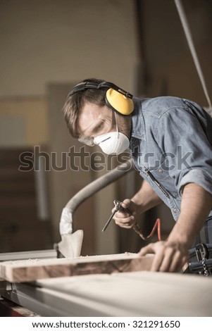 Worker wearing a safety mask and goggless for protection