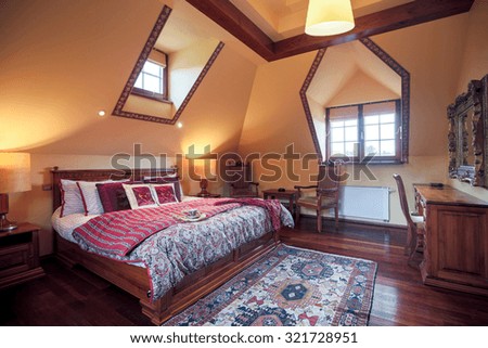 Image of neat furnished bedroom wit king size bed