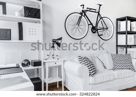 Bike on the wall in hipster\'s house