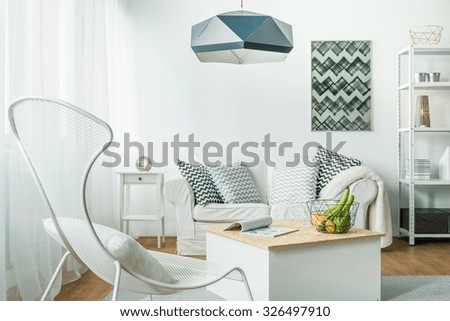 Metal trendy furniture in simple living room