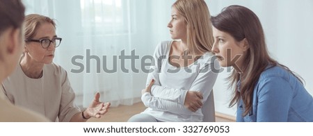 Panorama of female therapist counselling women with depression