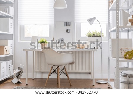 Picture of simple white study area in teenager room