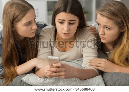 Image of sad girl and teenage break up via text