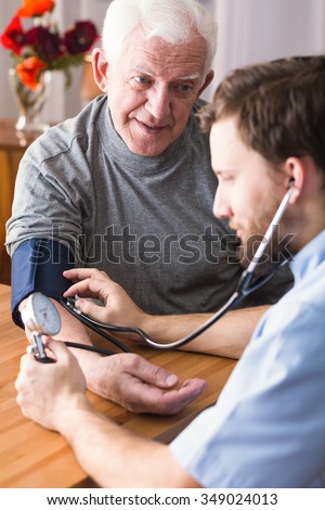 Photo of old man with high blood pressure
