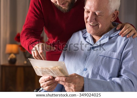 Photo of elderly man with critical illness having positive attitude