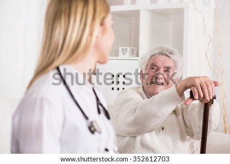 Photo of patient with walking problem and doctor