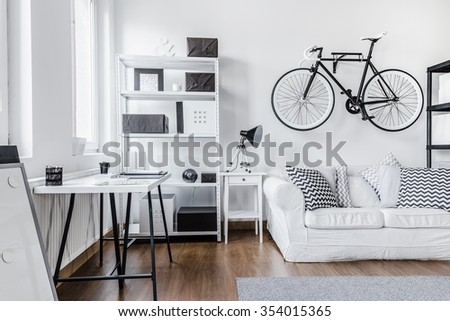 Trendy minimalist black and white studio flat