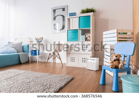 Spacious interior for child with flooring, carpet and new furniture