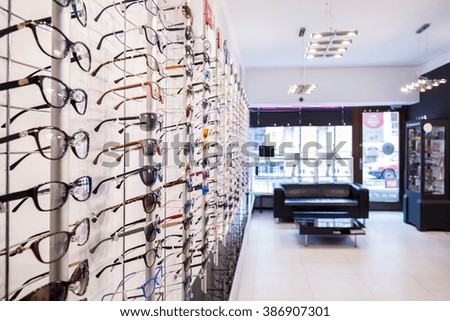 Optician\'s shop shelves with eyeglasses rims