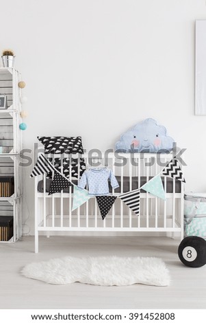 Shot of a crib in a scandinavian style baby room