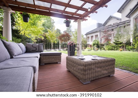 Cozy wicker couch on the terrace
