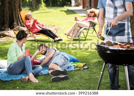 Couple enjoying free time on a picnic in park