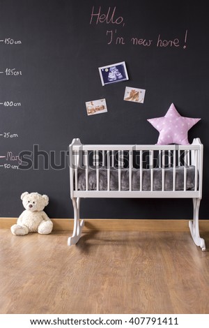 Shot of a modern baby room with a blackboard wall