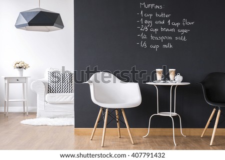 Shot of a modern room with a chalkboard wall