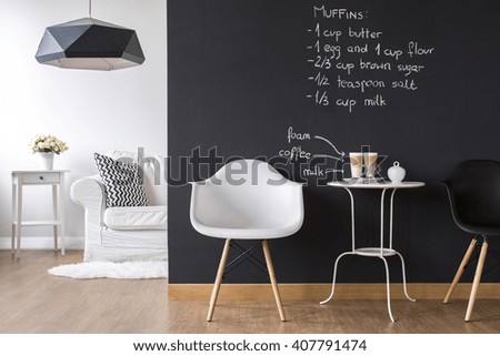 Shot of a modern room with a blackboard wall