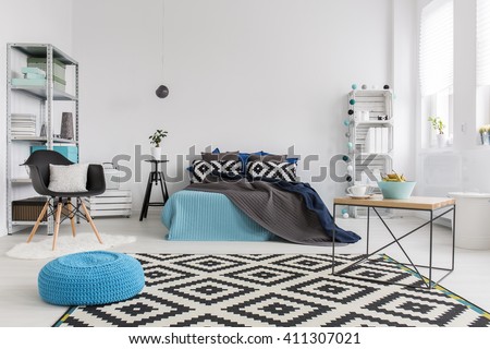 Shot of a modern cosy and spacious bedroom