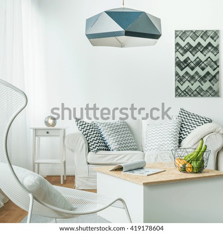 Metal trendy furniture in simple living room