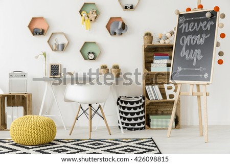 Shot of a modern comfortable room for kids with colorful shelves