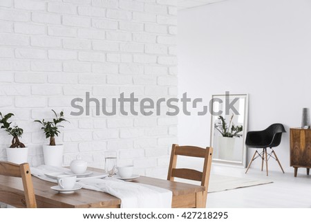 White loft design arrangement and minimalist furniture