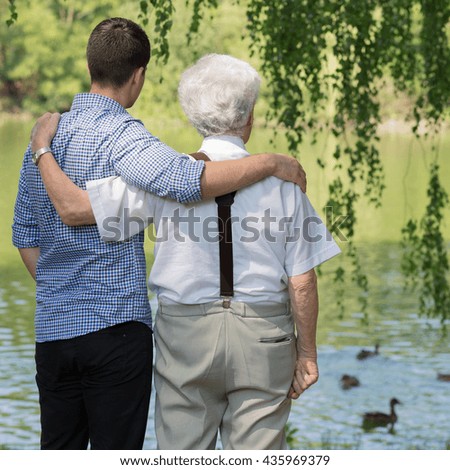 Picture of father and son spending leisure time in park