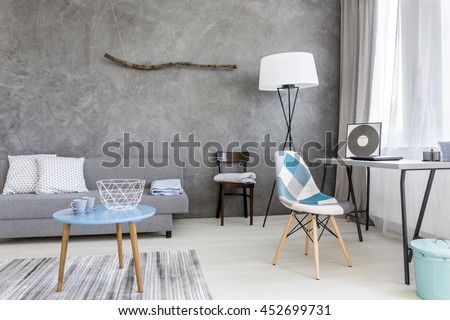 Shot of an elegant living room with a stylish blue coffee table