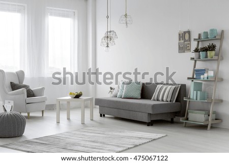 Minimalist arrangement in trendy bright mint flat interior