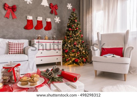 Light house with white furniture decorated for Christmas