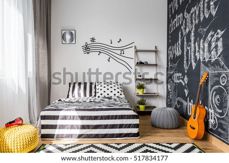 Shot of a cozy music inspired bedroom