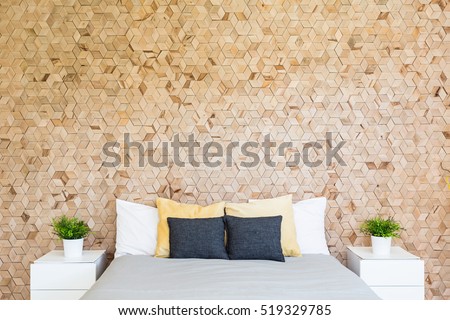 Modern eco-friendly bedroom with corkboard and big bed