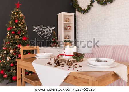 Christmas design of dining hall with wooden table set for dinner