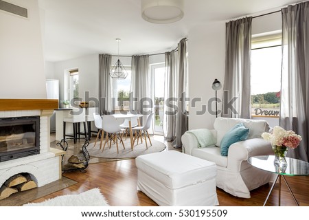 Shot of a stylish living room with white furniture