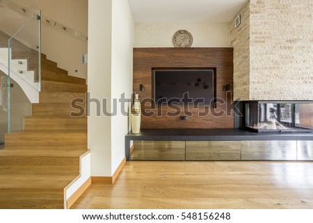Area of a house with the fireplace and stairs