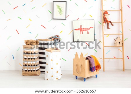 Child room with toy bags and wooden box