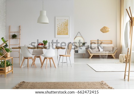 Simple bright dining room in slow life trend