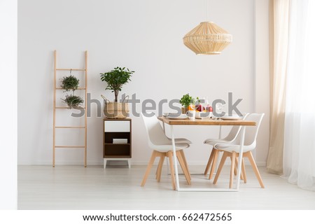 Bright minimal dining room in slow life trend
