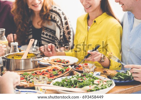 Vegetarians eat healthy and organic food during meeting in friend\'s house
