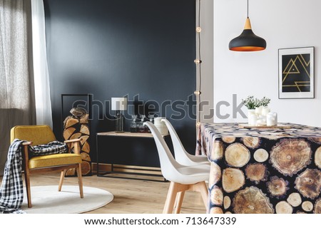 Wood design of modern interior with scandinavian furniture on black wall