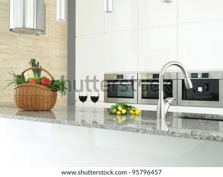 Modern kitchen interior with vegetables, glasses of wine and flowers