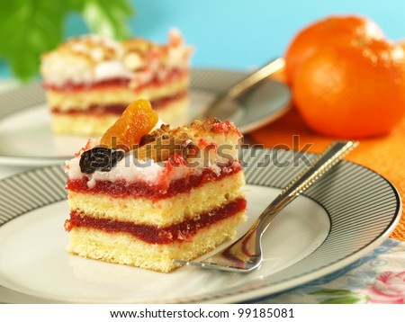 Strawberry sponge cake with dried fruits and nuts