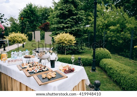 catering services in restaurant. Wedding table reception on wedding ceremony in the park